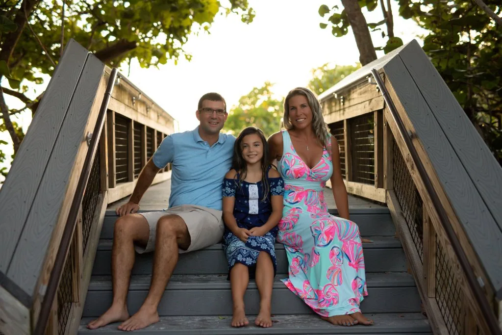 The Naples Tint Company family on the beach